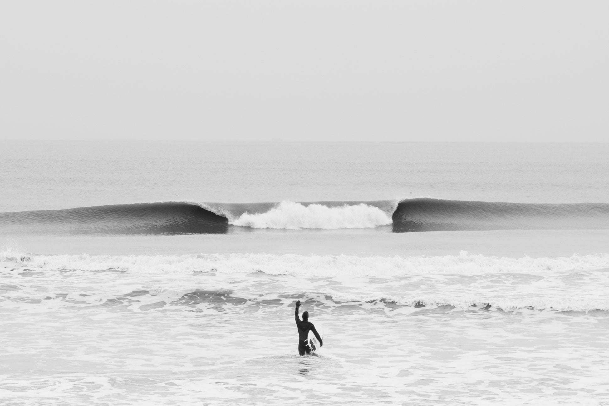 Surfer vor A-frame Welle auf Norderney